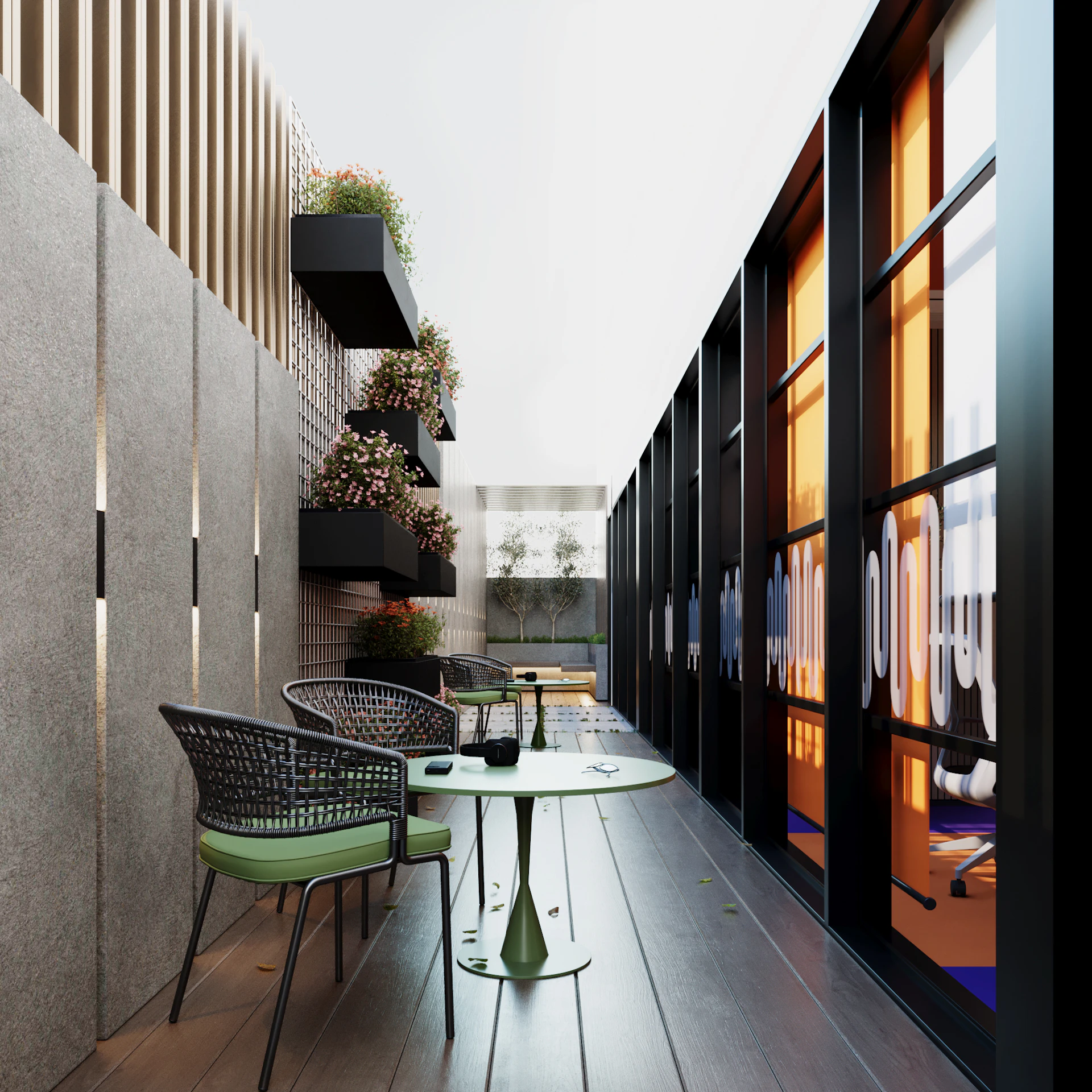 A modern, stylish indoor patio features sleek black-framed floor-to-ceiling windows, two round green tables with matching chairs, and lush potted plants along a textured wall, creating an inviting and contemporary atmosphere.