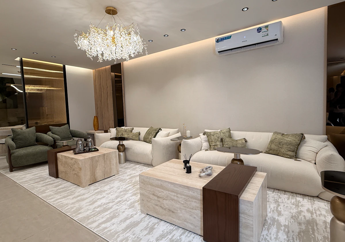 modern living room highlighting a mix of trendy colors from greens till neutral colors