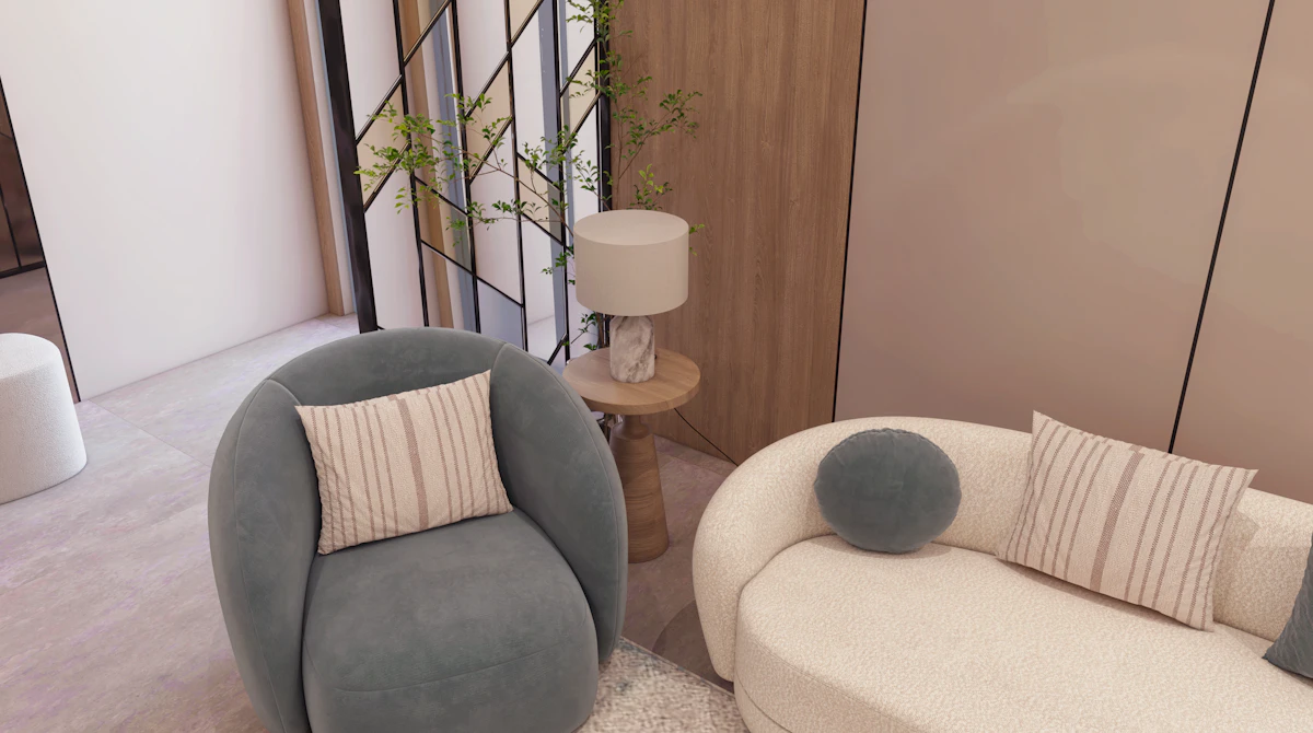 تصميم داخلي مودرن لمجلس ضيوف مع بهو استقبال متصل في الرياض، يتميز بأثاث عصري فاخر وإضاءة مبتكرة.