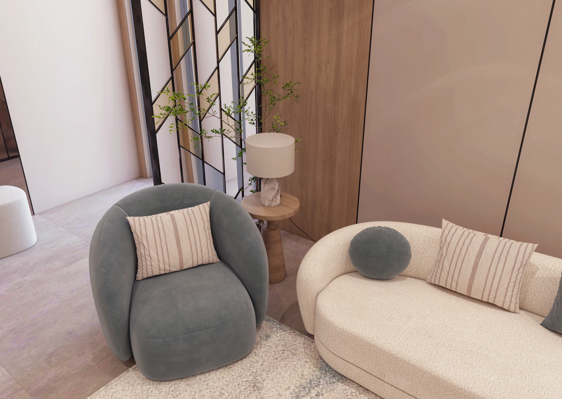 تصميم داخلي مودرن لمجلس ضيوف مع بهو استقبال متصل في الرياض، يتميز بأثاث عصري فاخر وإضاءة مبتكرة.
