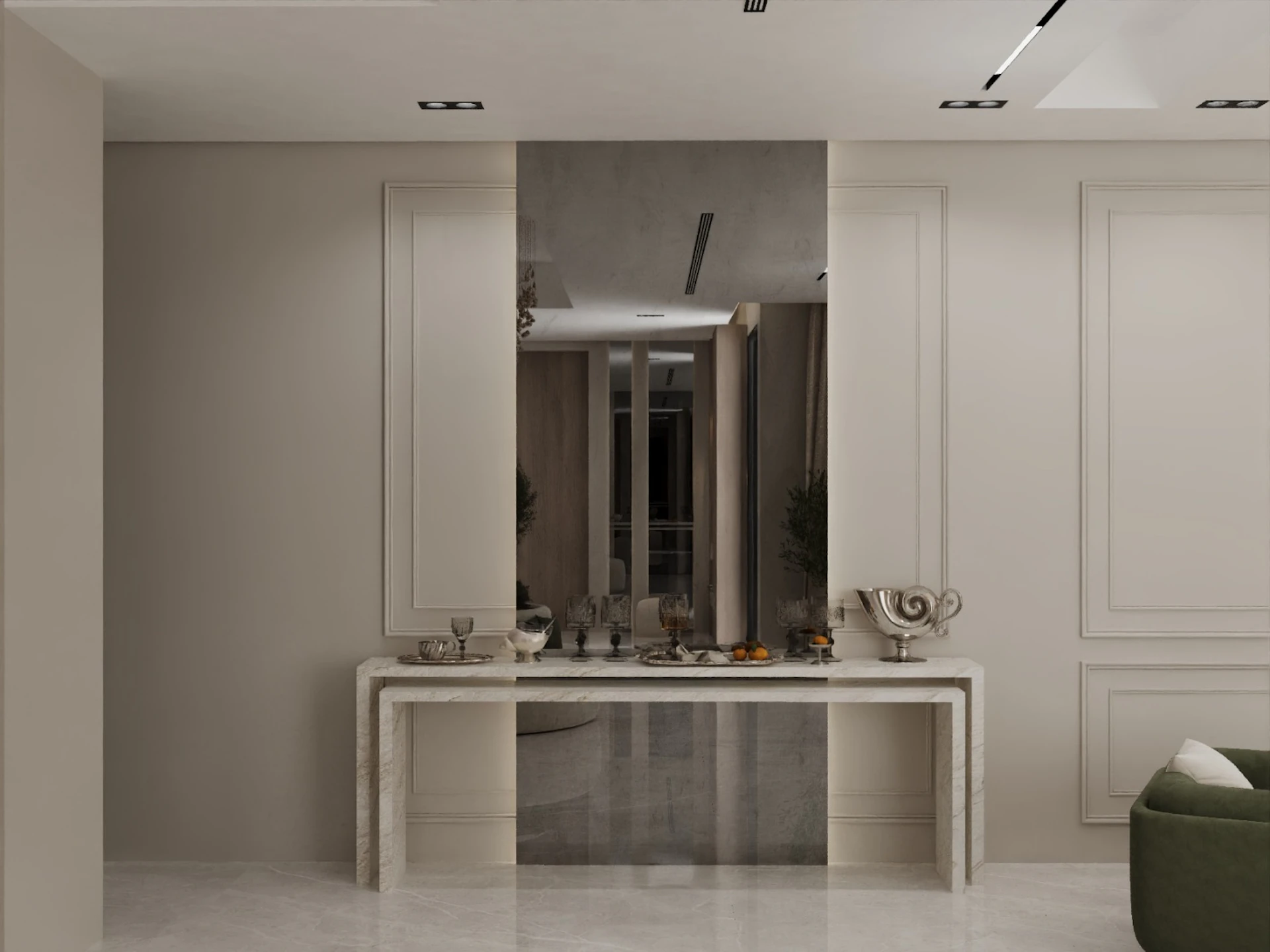 A modern interior features a sleek marble console table adorned with decorative items, set against a mirrored wall panel, framed by elegant paneling and soft lighting.
