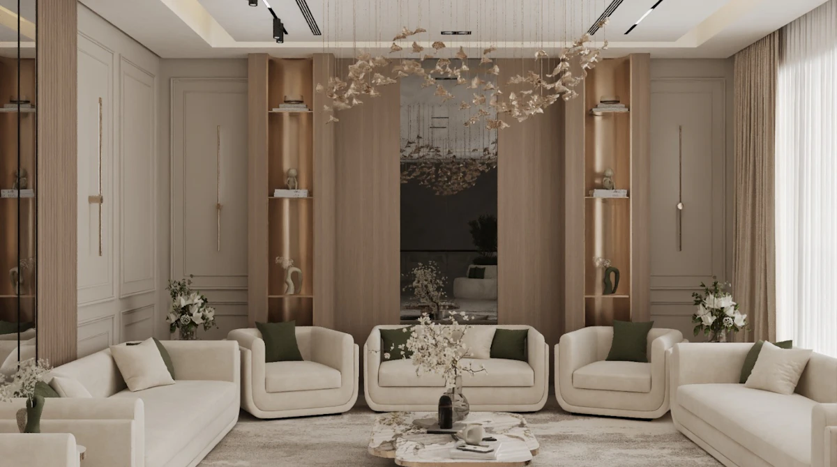 A spacious, elegantly designed living room features a central marble coffee table, surrounded by light beige sofas, with large windows allowing natural light to highlight the minimalist decor and hanging modern chandelier.