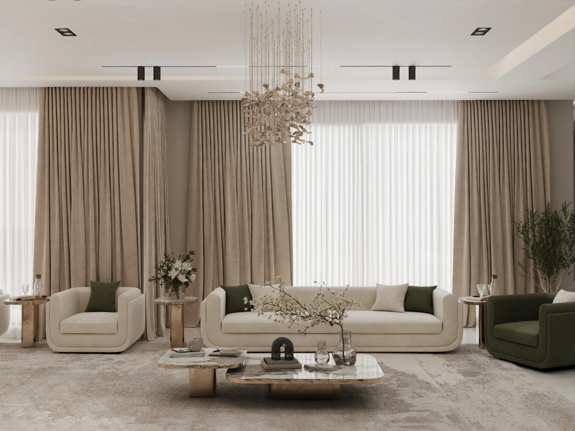A modern living room features elegant beige sofas with dark green accent pillows, a luxurious crystal chandelier, and large windows draped with floor-length curtains, creating a sophisticated and inviting space.