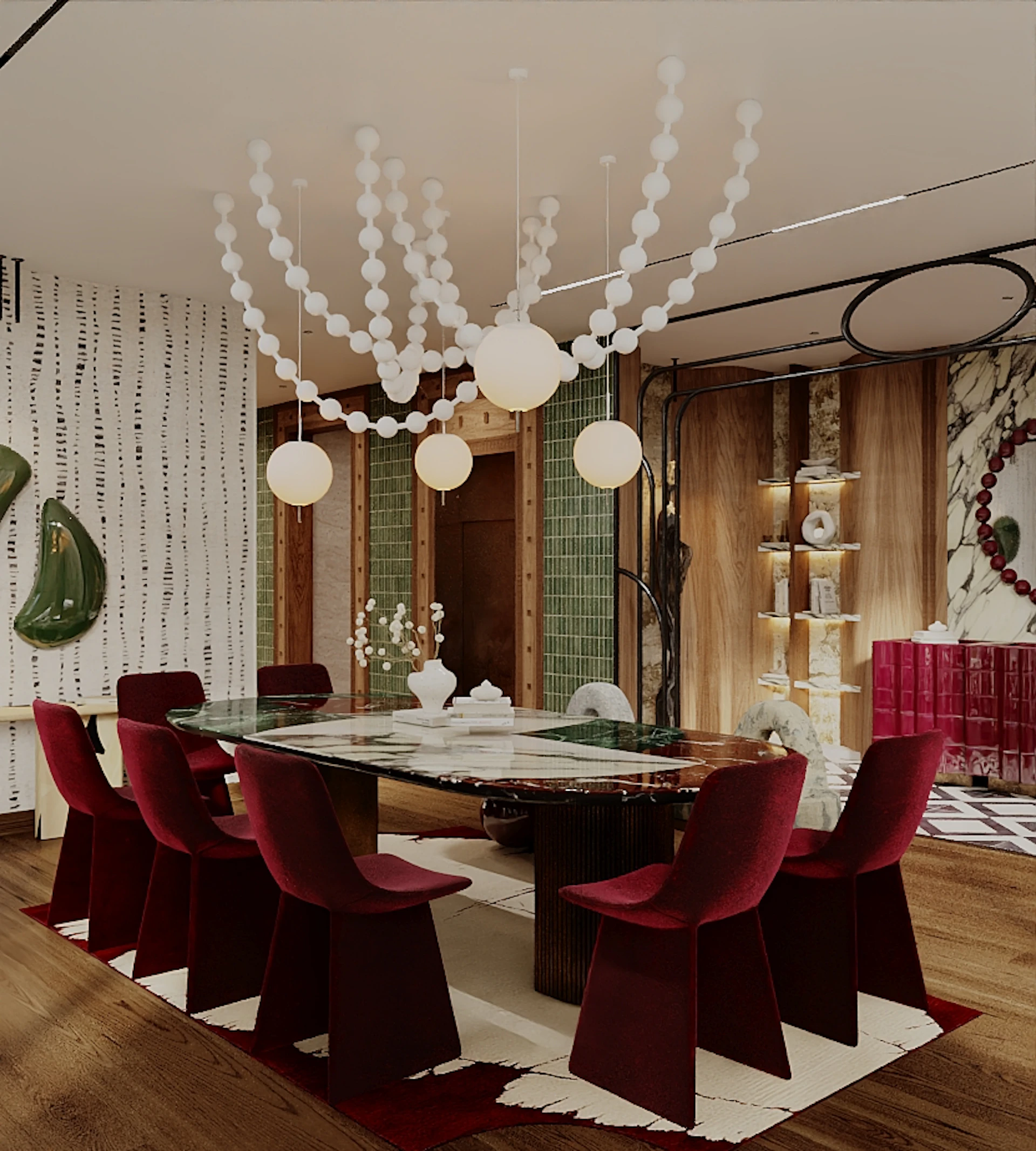 Fluted burgundy cabinet beside a veined marble wall with a red bead garland